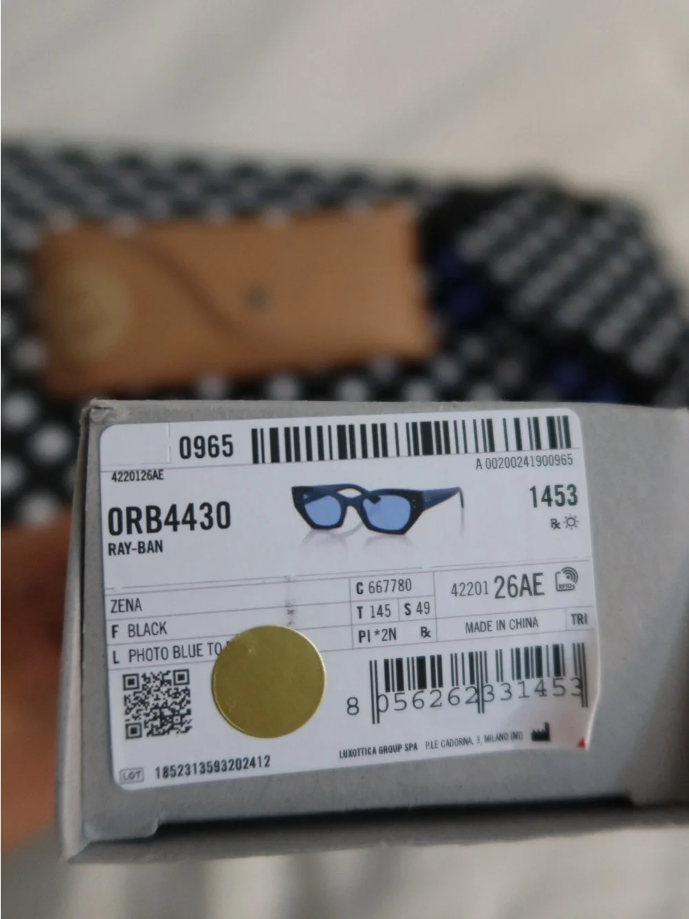 Ray-Ban Women's Black Frame Sunglasses with Light Blue Lenses